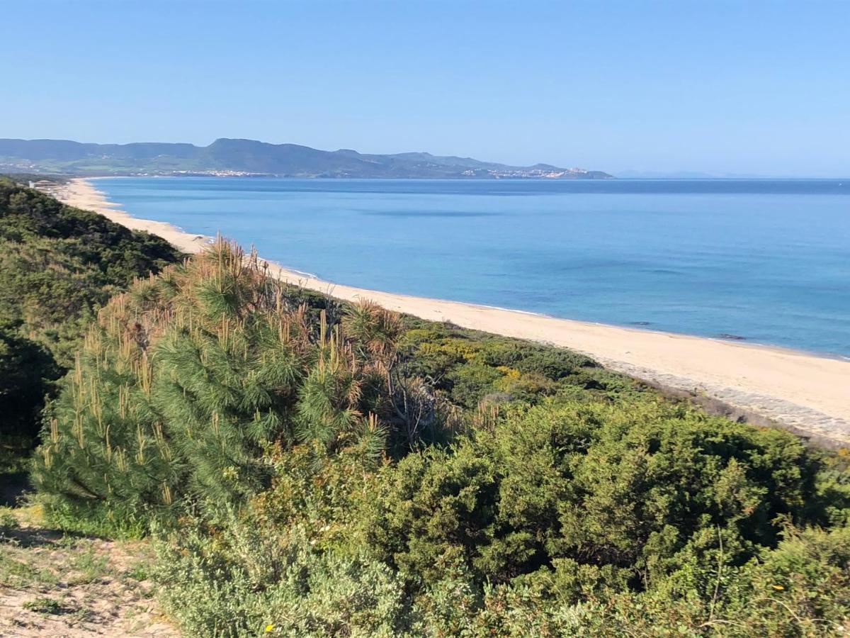 Borgo Spiaggia Isola Rossa Bagian luar foto