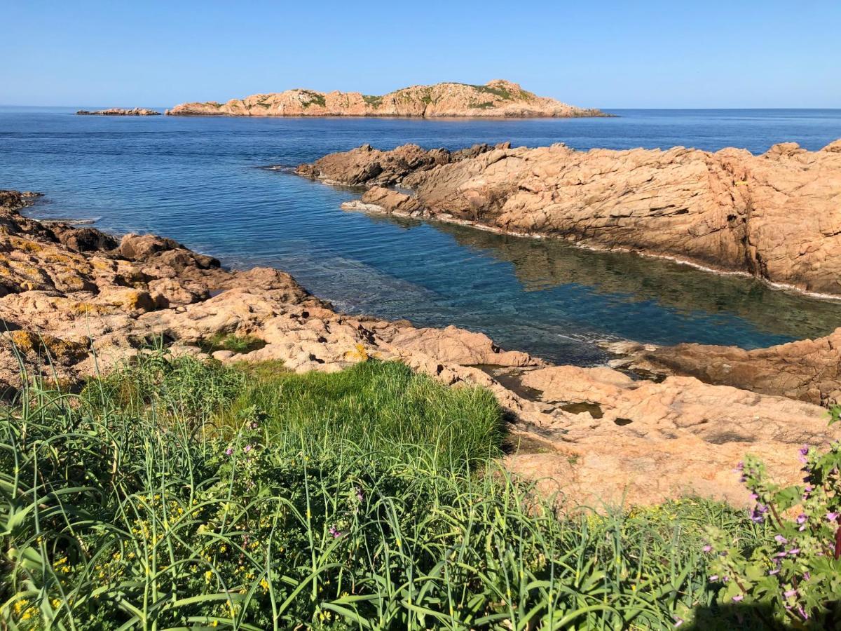 Borgo Spiaggia Isola Rossa Bagian luar foto