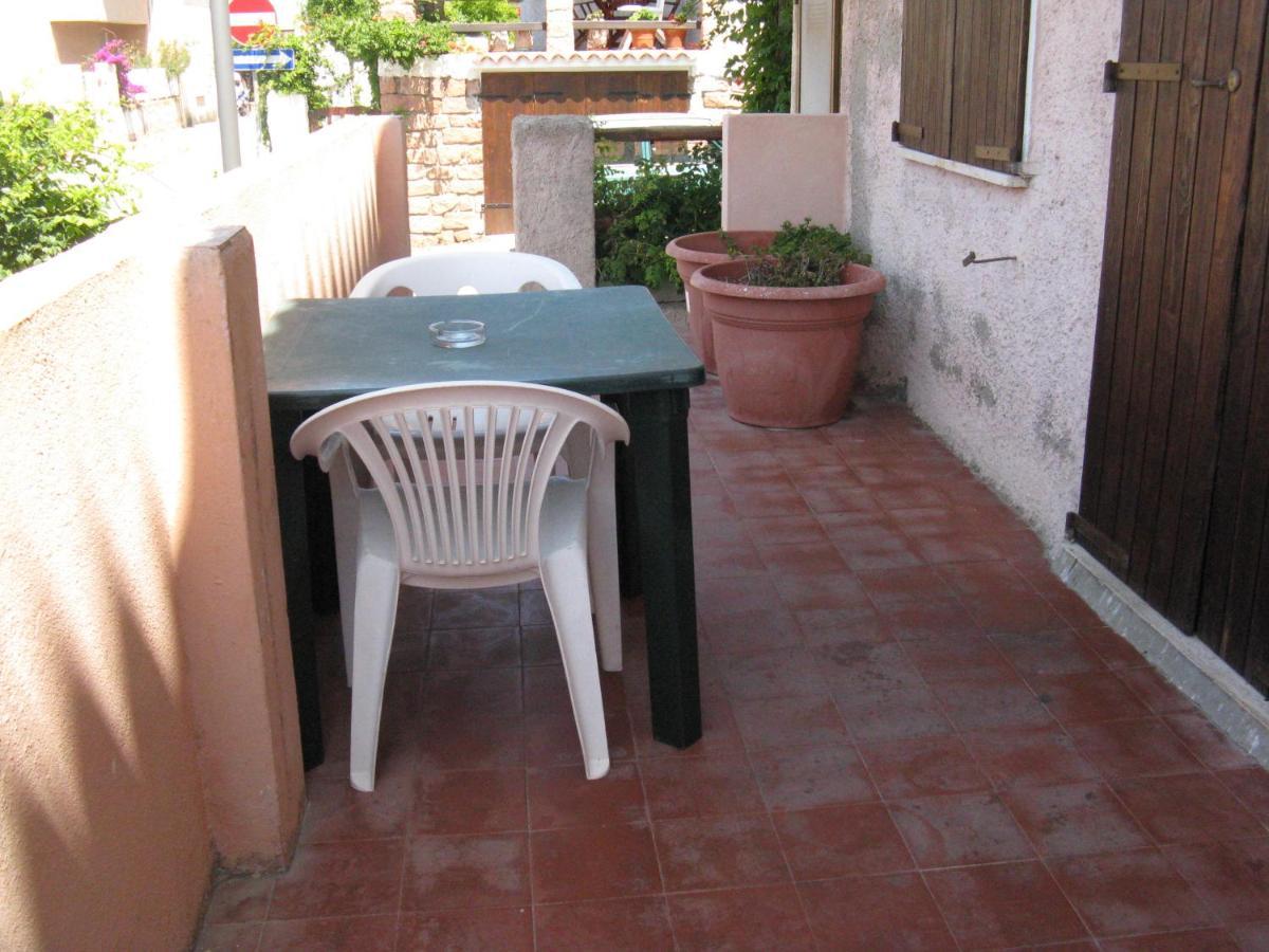 Borgo Spiaggia Isola Rossa Bagian luar foto